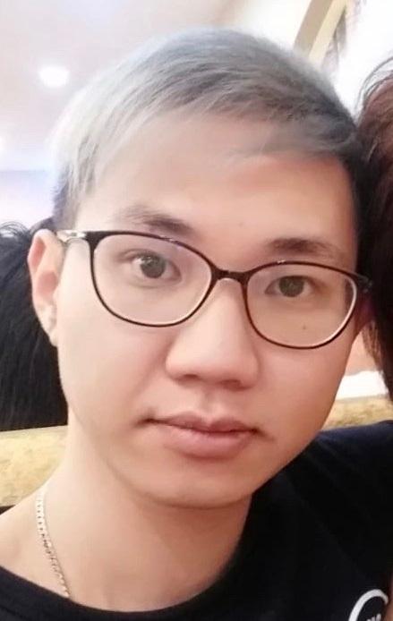 Lau Nap-chun, aged 28, is about 1.65 metres tall, 63 kilograms in weight and of medium build. He has a round face with yellow complexion and blond hair.