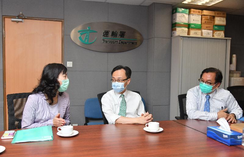 The Secretary for the Civil Service, Mr Patrick Nip (centre), today (April 28) visited a Driving Test Centre in Ho Man Tin to learn more about the preparations made by the Transport Department for the resumption of driving tests. Also present is the Commissioner for Transport, Ms Mable Chan (left).