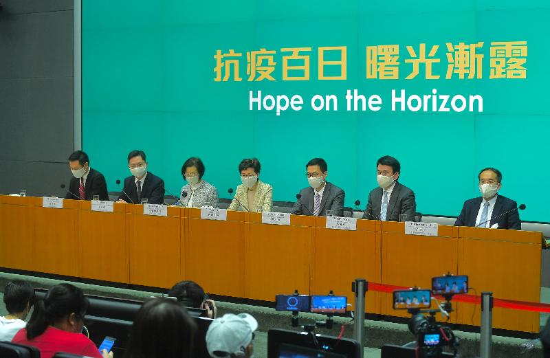 The Chief Executive, Mrs Carrie Lam (centre), holds a press conference on measures to fight the epidemic with the Secretary for Commerce and Economic Development, Mr Edward Yau (second right); the Secretary for Food and Health, Professor Sophia Chan (third left); the Secretary for Education, Mr Kevin Yeung (third right); the Secretary for Innovation and Technology, Mr Alfred Sit (second left); the Secretary for Home Affairs, Mr Caspar Tsui (first left); and the Secretary for Financial Services and the Treasury, Mr Christopher Hui (first right), at the Central Government Offices, Tamar, today (May 5).