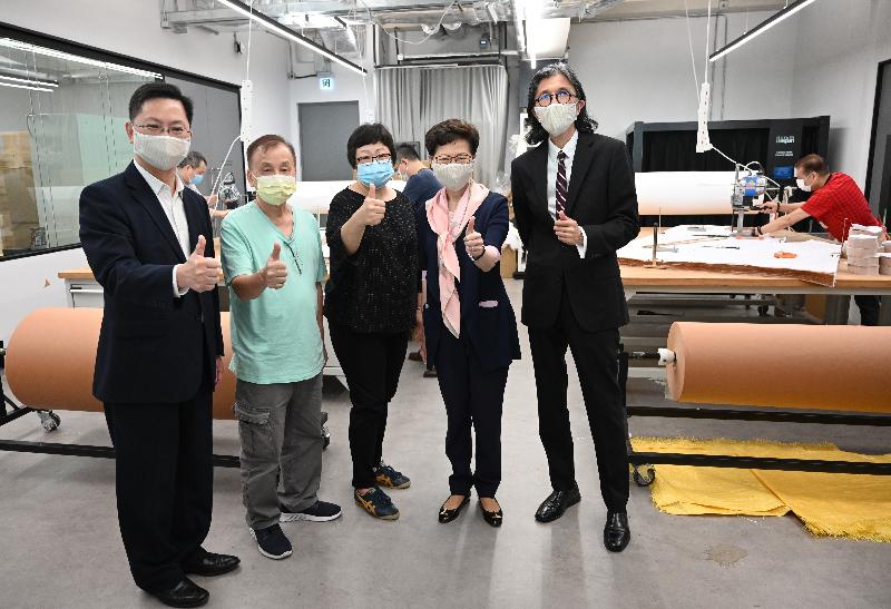 The Chief Executive, Mrs Carrie Lam (second right), this morning (May 6) inspected one of the production sites of CuMask+™ in Tsuen Wan. Photo shows Mrs Lam; the Secretary for Innovation and Technology, Mr Alfred Sit (first left); the Chief Executive Officer of the Hong Kong Research Institute of Textiles and Apparel, Mr Edwin Keh (first right); and workers.