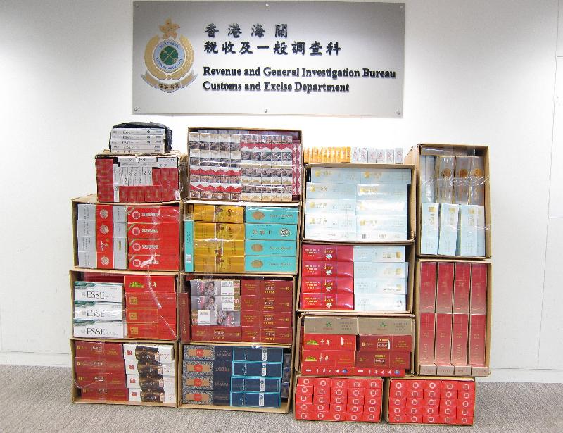 Hong Kong Customs today (May 13) detected two suspected illicit cigarette cases and seized a total of about 170 000 suspected illicit cigarettes and about 130 000 suspected illicit heat-not-burn products with an estimated market value of about $830,000 and a duty potential of about $570,000 in Kwun Tong, Tseung Kwan O, Causeway Bay and Tuen Mun. Photo shows some of the suspected illicit cigarettes seized in Kwun Tong and Tseung Kwan O.