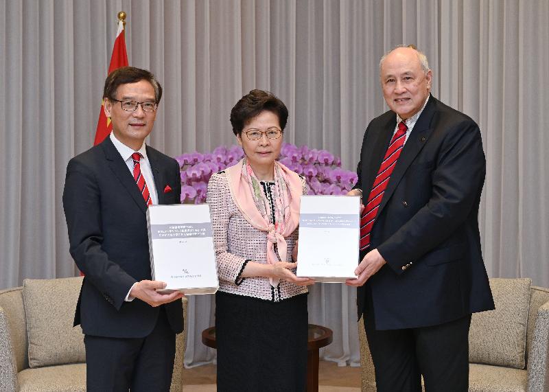 The Chief Executive, Mrs Carrie Lam (centre), receives today (May 15) from the Chairman of the Independent Police Complaints Council (IPCC), Mr Anthony Neoh, SC (right), and IPCC Vice-chairman Mr Tony Tse (left) the Thematic Study on the Public Order Events arising from the Fugitive Offenders Bill since June 2019 and the Police Actions in Response.