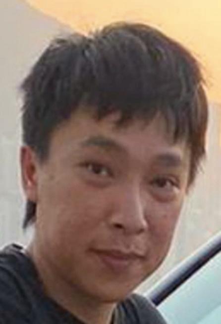 Wu Wai-man, aged 36, is about 1.78 metres tall and of medium build. He has a long face with yellow complexion and short black hair. He was last seen wearing a black shirt, black trousers, white sports shoes and a pair of black-rimmed glasses.