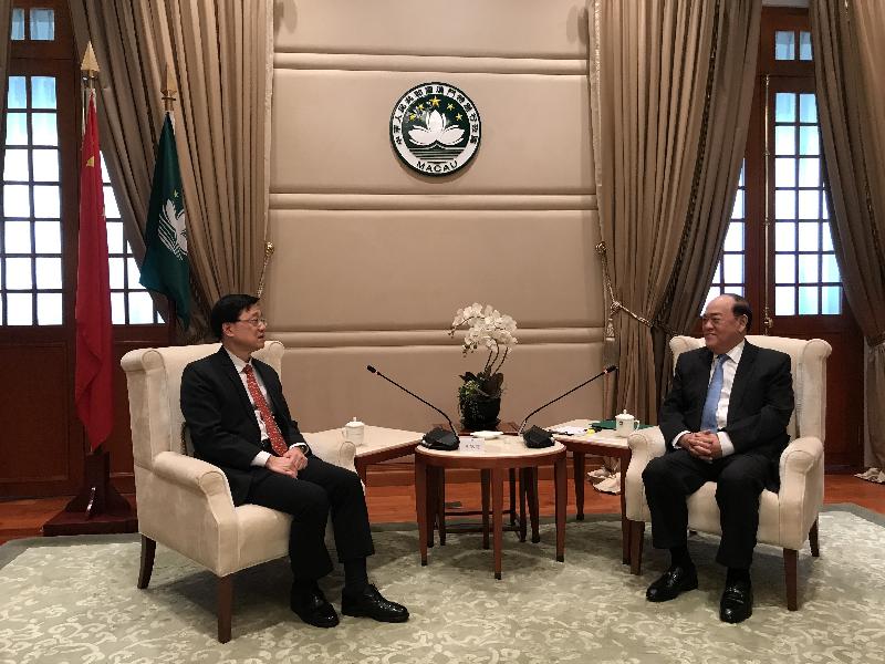 The Secretary for Security, Mr John Lee (left), calls on the Chief Executive of the Macao Special Administrative Region, Mr Ho Iat-seng, this afternoon (June 19) to learn more about the work on safeguarding national security in Macao and its latest development.