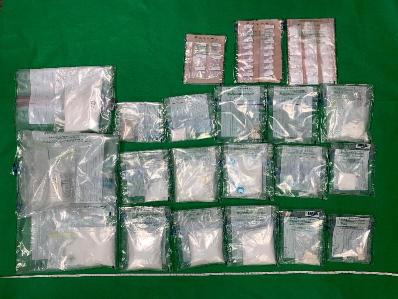Hong Kong Customs seized about 1.6 kilograms of suspected ketamine and about 300 grams of suspected crack cocaine with an estimated market value of about $1.3 million during an anti-narcotics operation conducted in Lai Chi Kok on June 26. Customs officers also seized about $7.8 million of suspected drug trafficking proceeds. Photo shows the suspected ketamine and suspected crack cocaine seized.