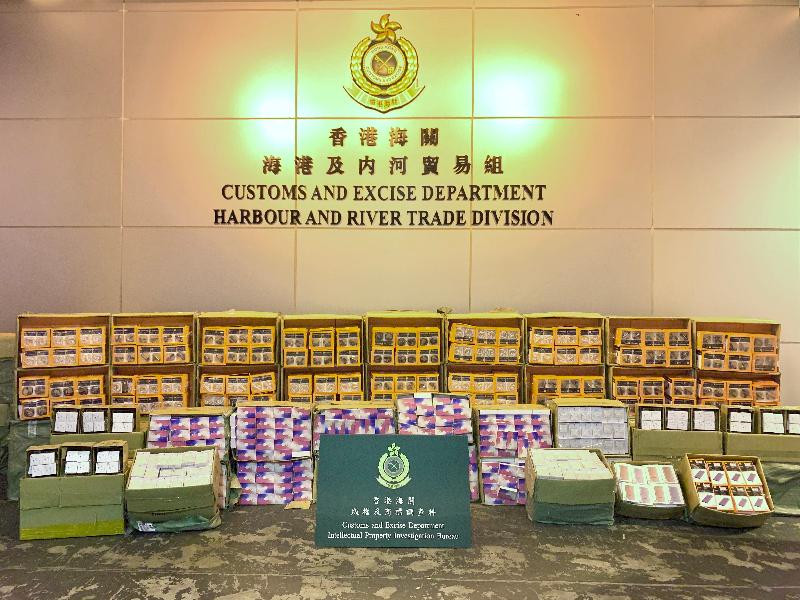 Hong Kong Customs seized about 25 000 items of suspected counterfeit mobile phone accessories with an estimated market value of about $900,000 at the River Trade Terminal, Tuen Mun, on June 27. Photo shows the suspected counterfeit mobile phone accessories seized.