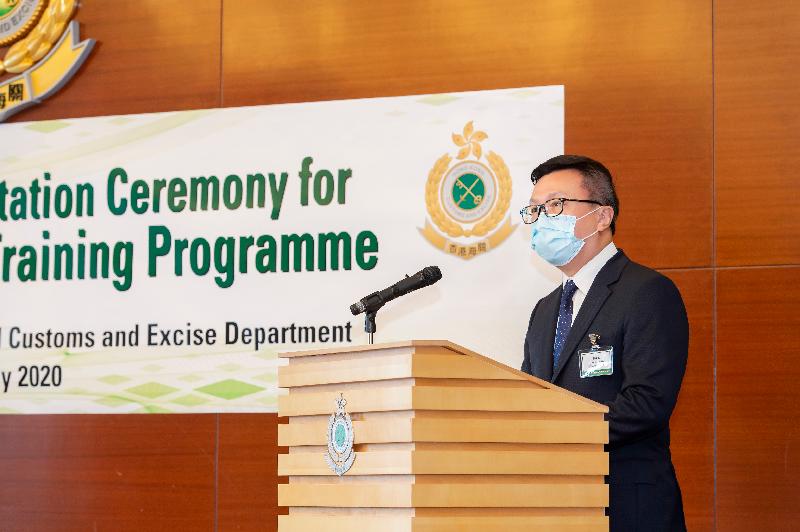 The Commissioner of Customs and Excise, Mr Hermes Tang, speaks at the certificate presentation ceremony of the Canine Breeding Training Programme at the Customs Headquarters Building today (July 10).