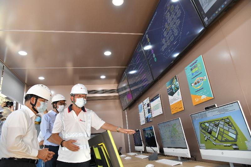 The Chief Secretary for Administration, Mr Matthew Cheung Kin-chung, today (July 13) visited Penny's Bay to inspect the construction progress of new quarantine facilities. Photo shows Mr Cheung (first left), accompanied by the Secretary for Development, Mr Michael Wong (second left), touring the on-site Smart Digital Control Centre.