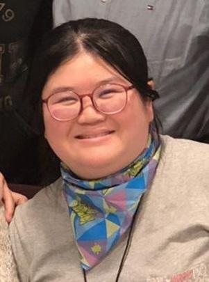 Cheng Sze-king, aged 37,  is about 1.8 metres tall, 90 kilograms in weight and of fat build. She has a round face with yellow complexion and short black hair.