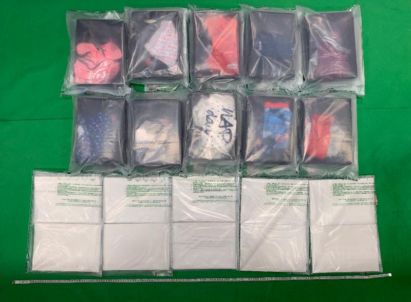 Hong Kong Customs seized about 5 kilograms of suspected ketamine with an estimated market value of about $2.5 million at Hong Kong International Airport on August 14. Photo shows the suspected ketamine seized and the carton boxes used to conceal dangerous drugs.