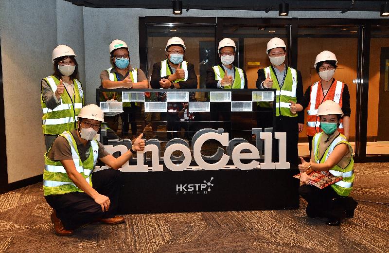 The Financial Secretary, Mr Paul Chan, today (September 4) visited the InnoCell, which is currently under construction at the Hong Kong Science Park, after visiting the community testing centre at the Park. Mr Chan (back row, third right) is pictured with the Secretary for Innovation and Technology, Mr Alfred Sit (back row, second right); the Permanent Secretary for Innovation and Technology, Ms Annie Choi (back row, first right); the Commissioner for Innovation and Technology, Ms Rebecca Pun (back row, first left); the Chairman of the Board of Directors of the Hong Kong Science and Technology Parks Corporation (HKSTP), Dr Sunny Chai (back row, third left); the Chief Executive Officer of the HKSTP, Mr Albert Wong (front row, left); and staff members at the InnoCell.
