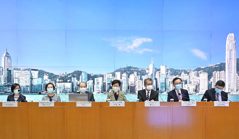 The Chief Executive, Mrs Carrie Lam (centre), holds a press conference on measures to fight the disease with the Chief Secretary for Administration, Mr Matthew Cheung Kin-chung (third left); the Financial Secretary, Mr Paul Chan (third right); the Secretary for Food and Health, Professor Sophia Chan (second left); the Secretary for the Civil Service, Mr Patrick Nip (second right); the Director of Health, Dr Constance Chan (first left); and the Chief Executive of the Hospital Authority, Dr Tony Ko (first right), at the Central Government Offices, Tamar, today (September 15).