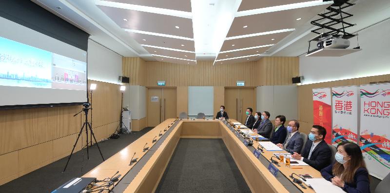 The Chief Executive, Mrs Carrie Lam (fourth right); the Secretary for Constitutional and Mainland Affairs, Mr Erick Tsang Kwok-wai (third right); and the Director of the Chief Executive's Office, Mr Chan Kwok-ki (fifth right), attend the 2020 Pan-Pearl River Delta Regional Co-operation Chief Executive Joint Conference via video conferencing at Central Government Offices today (September 18).