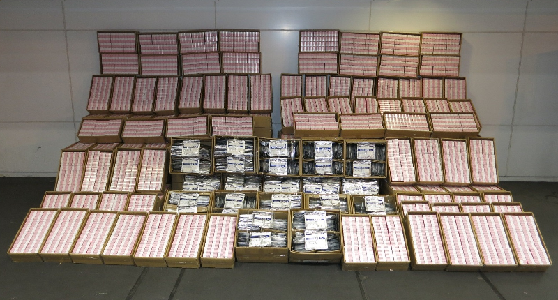 Hong Kong Customs in the past week consecutively seized multiple batches of medicines suspected of being imported not under and in accordance with a valid import licence at Lok Ma Chau Control Point. The medicines had an estimated market value of about $6.41 million in total. Seven drivers and five consignees were arrested. Photo shows the suspected illegally imported medicines seized on September 27.