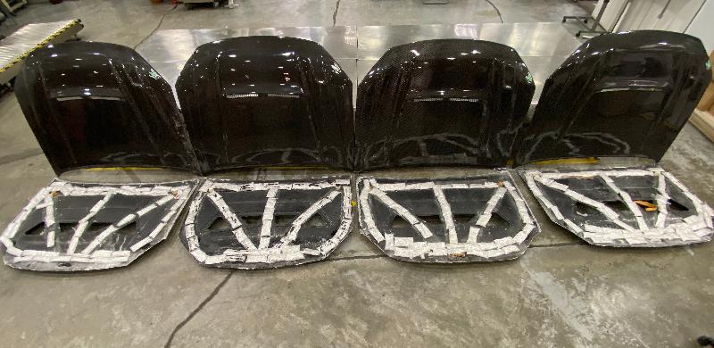Hong Kong Customs yesterday (October 21) detected the first drug trafficking case making use of car bonnets and seized about 17.6 kilograms of suspected methamphetamine with an estimated market value of about $10 million at Hong Kong International Airport. Photo shows the suspected methamphetamine taped inside false compartments between the top and bottom layers of the car bonnets.