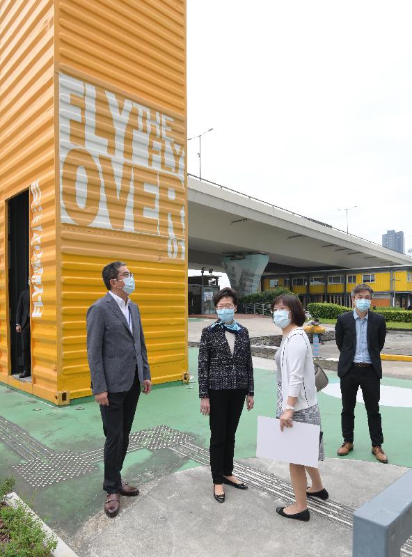 The Chief Executive, Mrs Carrie Lam (second left), today (October 22) visited Kwun Tong to learn more about the latest development of the Energizing Kowloon East project. Photo shows Mrs Lam visiting Fly the Flyover 01. Looking on are the Secretary for Development, Mr Michael Wong (first left) and the Head of Energizing Kowloon East Office, Ms Brenda Au (third left).