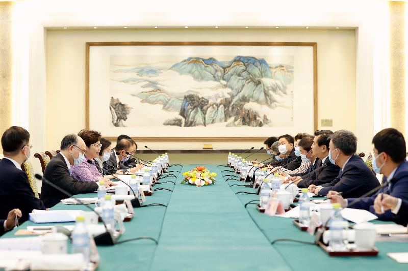 The Chief Executive, Mrs Carrie Lam (third left), meets with the Administrator of the Civil Aviation Administration of China, Mr Feng Zhenglin (third right), in Beijing today (November 4). The Director of the Liaison Office of the Central People's Government in the Hong Kong Special Administrative Region, Mr Luo Huining (fourth right); the Secretary for Transport and Housing, Mr Frank Chan Fan (second left); the Secretary for Food and Health, Professor Sophia Chan (fourth left); the Secretary for Innovation and Technology, Mr Alfred Sit (first left); the Secretary for Constitutional and Mainland Affairs, Mr Erick Tsang Kwok-wai (fifth left); and the Director of the Chief Executive's Office, Mr Chan Kwok-ki (sixth left), also joined the meeting.