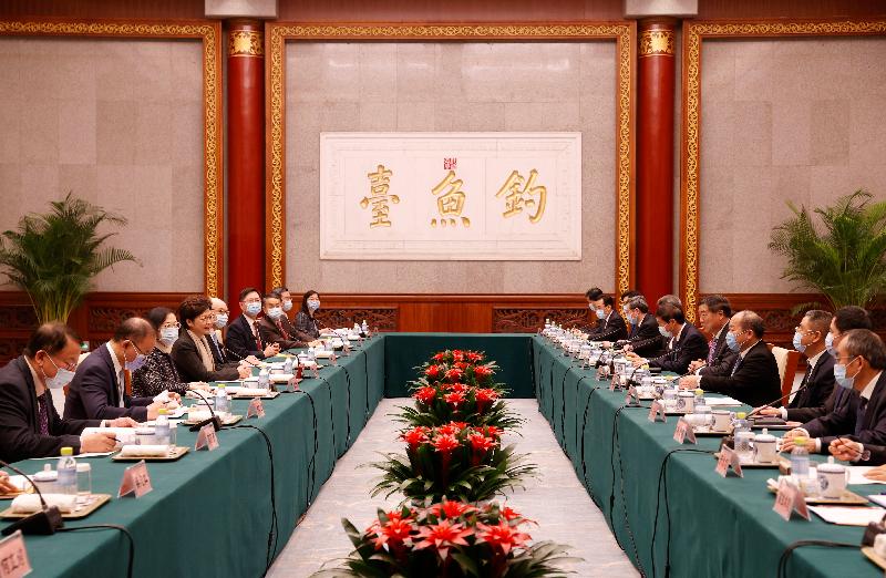 The Chief Executive, Mrs Carrie Lam (fourth left), meets with the Chairman of National Development and Reform Commission, Mr He Lifeng (fifth right), in Beijing today (November 5). The Secretary for Transport and Housing, Mr Frank Chan Fan (fifth left); the Secretary for Food and Health, Professor Sophia Chan (third left); the Secretary for Innovation and Technology, Mr Alfred Sit (sixth left); the Secretary for Constitutional and Mainland Affairs, Mr Erick Tsang Kwok-wai (second left); the Secretary for Financial Services and the Treasury, Mr Christopher Hui (seventh left); the Director of the Chief Executive's Office, Mr Chan Kwok-ki (first left), also joined the meeting.