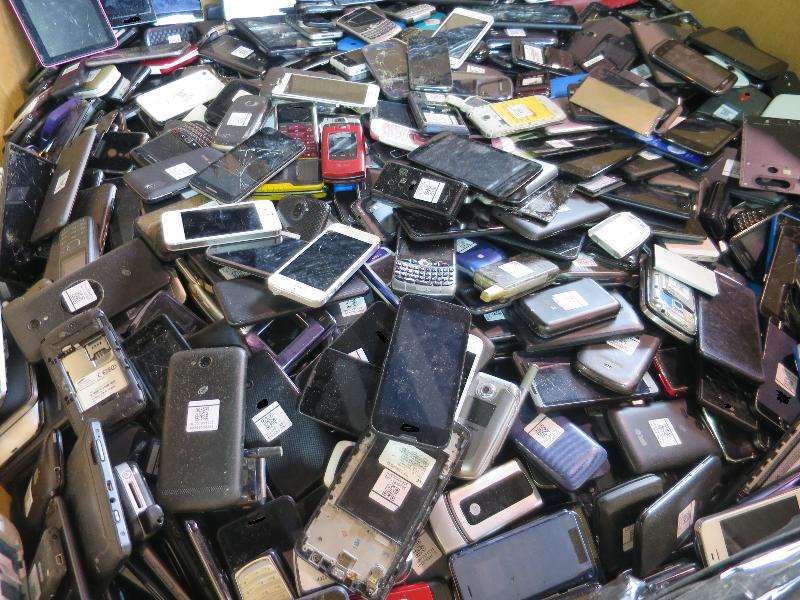 The Environmental Protection Department (EPD) intercepted two cases of illegal import of hazardous electronic waste from the United Kingdom and the United States. Photo shows some of the illegally imported waste mobile phone displays intercepted by the EPD at the Kwai Tsing Container Terminals in May this year.