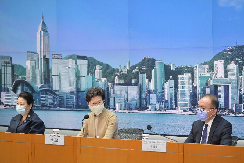The Chief Executive, Mrs Carrie Lam (centre), together with the Secretary for Justice, Ms Teresa Cheng, SC (left), and the Secretary for Constitutional and Mainland Affairs, Mr Erick Tsang Kwok-wai (right), meet the media at Central Government Offices, Tamar, today (November 11).