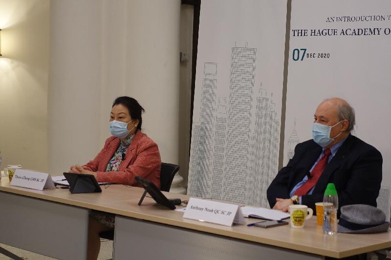 The Secretary for Justice, Ms Teresa Cheng, SC (left), speaks at the webinar on "An Introduction to the Hague Academy of International Law's 2021 Hong Kong Programme" today (December 7). Looking on is the host of the webinar, Chairman of the Asian Academy of International Law, Dr Anthony Neoh, SC (right). 

