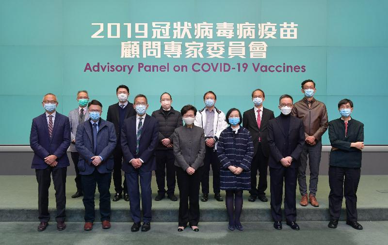The Chief Executive, Mrs Carrie Lam (front row, centre) today (December 30) pictured with members of the Advisory Panel on COVID-19 Vaccines, also present were the Secretary for Food and Health, Professor Sophia Chan (front row, third right), the convenor of the Advisory Panel on COVID-19 Vaccines, Professor Wallace Lau Chak-sing (front row, third left), members of the Advisory Panel on COVID-19 Vaccines, Dr Au Yeung Tung-wai (back row, first right), Professor Keiji Fukuda (front row, first left), Professor Lau Yu-lung (back row, second right), Dr Ho King-man (back row, first left), Professor David Hui Shu-cheong (front row, second left), Professor Ivan Hung Fan-ngai (back row, second left), Professor Gabriel Matthew Leung (front row, second right), Professor Raymond Liang Hin-suen (back row, third left), Dr Thomas Tsang Ho-fai (back row, third right), and Professor Yuen Kwok-yung (front row, first right).