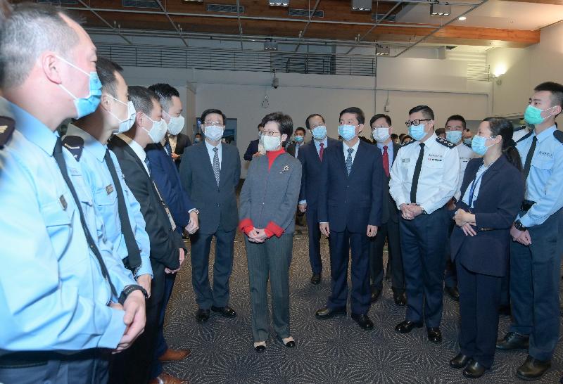 The Chief Executive, Mrs Carrie Lam (sixth left), visited the Hong Kong Police Force this afternoon (January 31) to learn more about its recent situation and met with the police officers who were injured earlier while handling illegal violent incidents to give them her regards. Photo shows Mrs Lam chatting with the police officers at the Police Headquarters in Wan Chai. Looking on are the Director of the Liaison Office of the Central People's Government in the Hong Kong Special Administrative Region (CPGLO), Mr Luo Huining (sixth right); the Deputy Director of the CPGLO, Mr Yang Jianping (seventh left); the Director-General of the Police Liaison Department of the CPGLO, Mr Chen Feng (fifth right); the Secretary for Security, Mr John Lee (fifth left) and the Commissioner of Police, Mr Tang Ping-keung (fourth right).