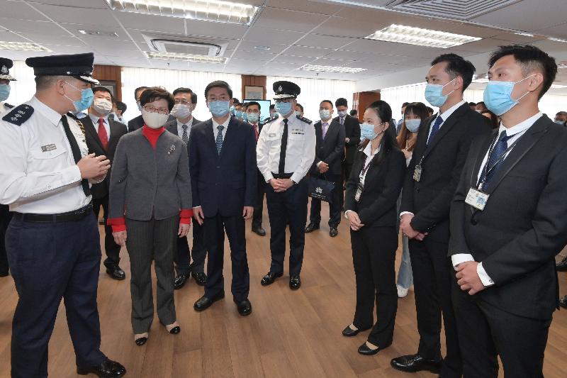 The Chief Executive, Mrs Carrie Lam (second left), visited the Hong Kong Police Force this afternoon (January 31) to learn more about its recent situation and met with the police officers who were injured earlier while handling illegal violent incidents to give them her regards. Photo shows Mrs Lam chatting with the police officers at the Tsim Sha Tsui Police Station. Looking on are the Director of the Liaison Office of the Central People's Government in the Hong Kong Special Administrative Region, Mr Luo Huining (third left) and the Commissioner of Police, Mr Tang Ping-keung (fourth left).