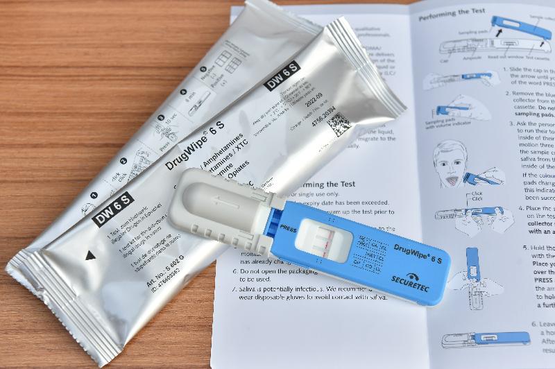 Police adopt Rapid Oral Fluid Test (ROFT) to combat drug driving. Photo shows the ROFT instrument "DrugWipe®6S".