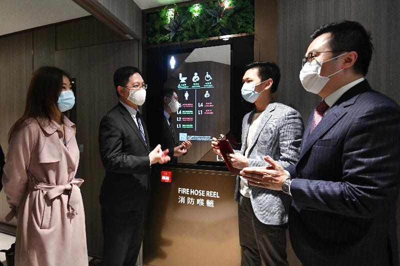 The Secretary for Innovation and Technology, Mr Alfred Sit (second left), sees for himself the application of Smart Washroom AIoT Solution developed by local start-up Bluetech IoT Ltd at MetroPlaza in Kwai Fong today (February 19). The Smart Washroom AIoT Solution is the winner of Award of the Year at the Hong Kong ICT Awards 2020 and has been adopted by shopping malls for commercial use.