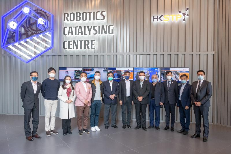 The Legislative Council (LegCo) Panel on Commerce and Industry visited the Hong Kong Science Park today (February 23). Photo shows LegCo Members visiting the Robotics Catalysing Centre 2.0 to learn more about robotics technology. From right: LegCo Members Mr Shiu Ka-fai, Mr Yiu Si-wing, Mr Chan Chun-ying and Mr Wong Ting-kwong; the Chairman of the Hong Kong Science and Technology Parks Corporation (HKSTPC), Dr Sunny Chai; LegCo Members Mr Chung Kwok-pan, Dr Lo Wai-kwok, Mr Lau Kwok-fan, Mr Michael Tien, Ms Elizabeth Quat and Dr Cheng Chung-tai; and the Chief Executive Officer of HKSTPC, Mr Albert Wong.