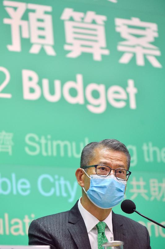 The Financial Secretary, Mr Paul Chan, held a press conference on the 2021-22 Budget this afternoon (February 24) at the Central Government Offices in Tamar. Photo shows Mr Chan elaborating on the Budget at the press conference.

