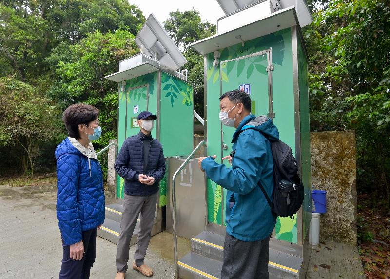 The Chief Executive, Mrs Carrie Lam, visited Lai Chi Wo today (February 27) to learn more about the work of the Countryside Conservation Office (CCO) of the Environmental Protection Department. Photo shows Mrs Lam (left), accompanied by the Secretary for the Environment, Mr Wong Kam-sing (centre), receiving a briefing from the Head of the CCO, Professor Stephen Tang (right) on public toilet improvement works.
