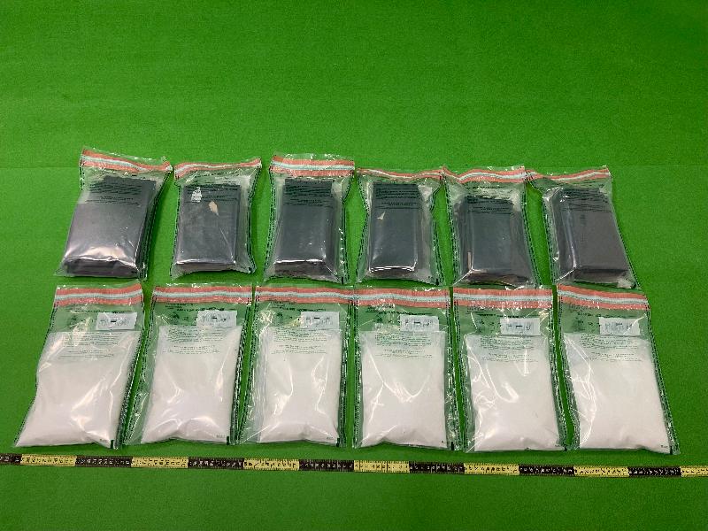 Hong Kong Customs seized about 3 kilograms of suspected ketamine with an estimated market value of about $1.8 million at Hong Kong International Airport on March 9. One man was subsequently arrested today (March 12). Photo shows the suspected ketamine seized and the cardboard used to conceal the dangerous drugs.