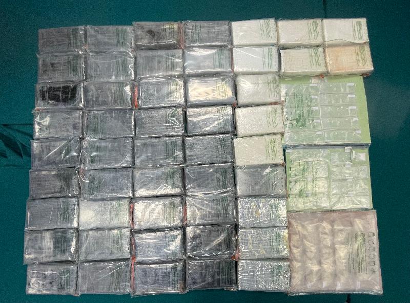 Hong Kong Customs seized about 54 kilograms of suspected cocaine and about 700 grams of suspected crack cocaine with an estimated market value of about $73 million in Sai Kung on March 29. Photo shows the suspected cocaine and suspected crack cocaine seized.