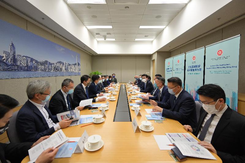 The Secretary for Commerce and Economic Development, Mr Edward Yau (fifth right), today (March 31) briefed representatives of the Chinese Manufacturers' Association of Hong Kong on the improvements to the electoral system of Hong Kong.