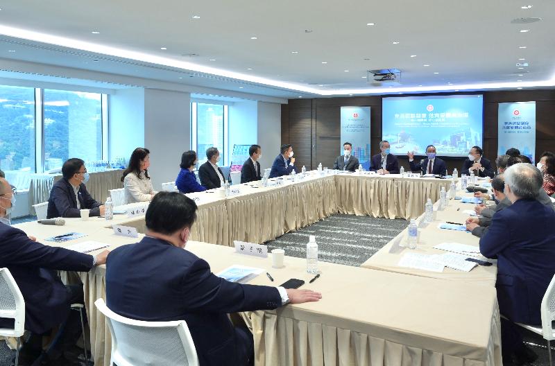 The Secretary for Constitutional and Mainland Affairs, Mr Erick Tsang Kwok-wai (tenth left), this afternoon (March 31) chaired two briefing sessions to brief Hong Kong deputies to the National People's Congress (NPC) and Hong Kong members of the Chinese People's Political Consultative Conference (CPPCC) on the background, concepts and main contents of improving the electoral system of the Hong Kong Special Administrative Region, and the important roles of the Hong Kong deputies to the NPC and Hong Kong members of the CPPCC.