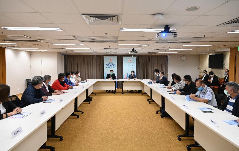 The Secretary for Security, Mr John Lee (eighth left), today (April 7) briefed the representatives of District Fight Crime Committees, District Fire Safety Committees and Area Committees of three districts on the background and objectives of improving Hong Kong Special Administrative Region's electoral system. The Permanent Secretary for Security, Ms Carol Yip (eighth right), also attended.