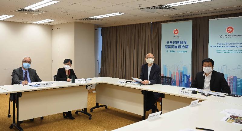 The Secretary for the Environment, Mr Wong Kam-sing, met with representatives of district organisations at two briefing sessions today (April 9) to explain the improvements to the Hong Kong Special Administrative Region (HKSAR)'s electoral system, with a view to enabling the local representatives to have a better understanding of the matter and thereby render their support. Picture shows (from left) the Under Secretary for the Environment, Mr Tse Chin-wan; the Permanent Secretary for the Environment/Director of Environmental Protection, Ms Maisie Cheng; Mr Wong; and the Under Secretary for Home Affairs, Mr Jack Chan, attending a briefing session to elaborate on the background and objectives of the improvements to the HKSAR's electoral system.
