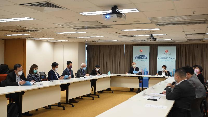 The Secretary for the Environment, Mr Wong Kam-sing, met with representatives of district organisations at two briefing sessions today (April 9) to explain the improvements to the Hong Kong Special Administrative Region (HKSAR)'s electoral system, with a view to enabling the local representatives to have a better understanding of the matter and thereby render their support. Picture shows (from fifth left) the Under Secretary for the Environment, Mr Tse Chin-wan; the Permanent Secretary for the Environment/Director of Environmental Protection, Ms Maisie Cheng; Mr Wong; and the Under Secretary for Home Affairs, Mr Jack Chan, attending a briefing session to elaborate on the background and objectives of the improvements to the HKSAR's electoral system.