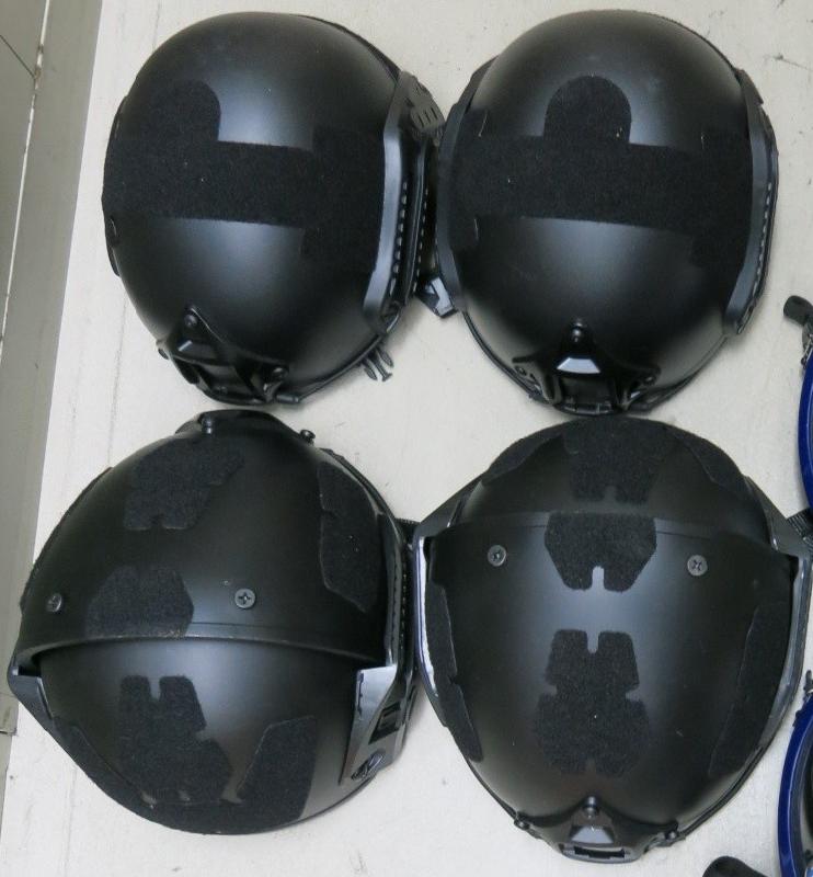 Hong Kong Customs and the Police conducted a joint operation yesterday (April 12) and today (April 13) in Mong Kok and Ma On Shan to combat the illegal import of strategic commodities. A batch of strategic commodities suspected to be imported without a valid licence was seized, including 133 gas masks, 175 filter canisters and four helmets. Eight persons were arrested. Photo shows the helmets seized.