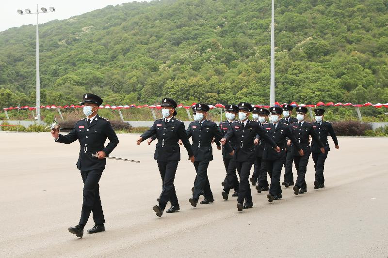 The Fire Services Department held an open day at the Fire and Ambulance Services Academy today (April 15), to introduce training facilities in the academy. Various demonstrations, experiences and performances were arranged for the public. Photo shows fire and ambulance personnel performing the Chinese-style marching.