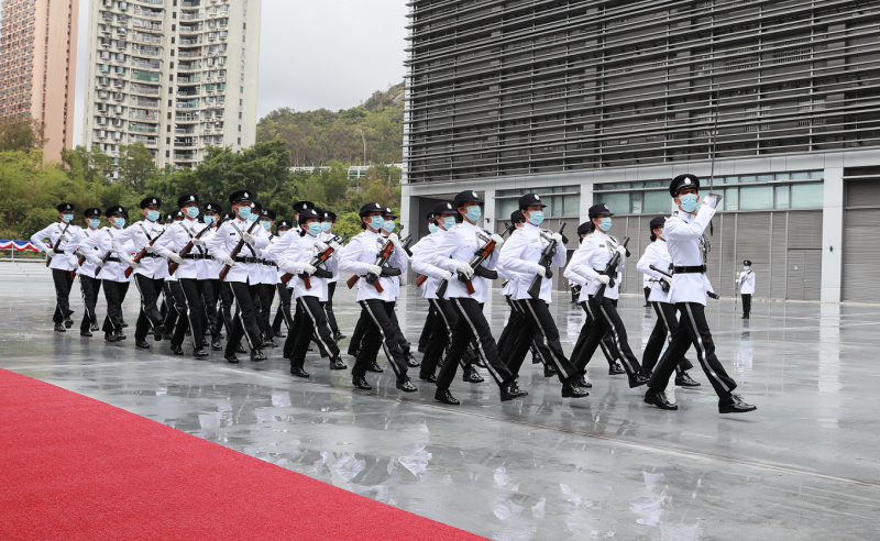 In support of the National Security Education Day, the Immigration Service Institute of Training and Development held an open day today (April 15). Photo shows the Departmental Contingent giving a ceremonial rifle foot drill performance in Chinese style during the open day. 