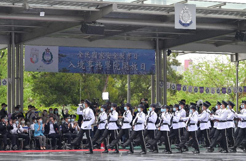 The Chief Executive, Mrs Carrie Lam, today (April 15) visited the Immigration Service Institute of Training and Development in Tuen Mun, joining members of the public to participate in the open day activities at the training schools of the disciplinary forces organised in support of National Security Education Day. Photo shows Mrs Lam (first row, third left) watching a foot drill performance. Looking on is the Director of Immigration, Mr Au Ka-wang (first row, first left).
