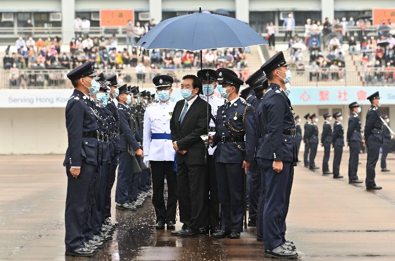 The Chairman of the Standing Committee on Disciplined Services Salaries and Conditions of Service, Dr Chui Hong-sheung, attends a passing-out parade at the Hong Kong Police College today (April 17).