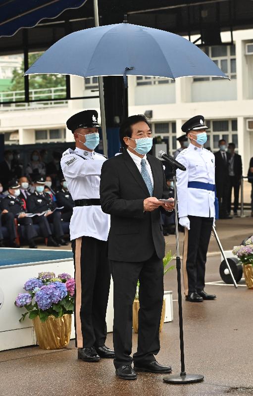 The Chairman of the Standing Committee on Disciplined Services Salaries and Conditions of Service, Dr Chui Hong-sheung, speaks at a passing-out parade at the Hong Kong Police College today (April 17).