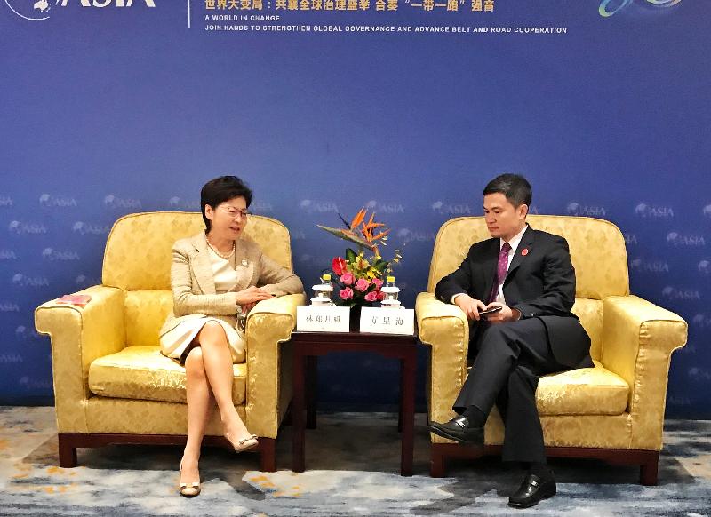 The Chief Executive, Mrs Carrie Lam, today (April 20) attended the Boao Forum for Asia Annual Conference 2021 in Hainan. Photo shows Mrs Lam (left) meeting with the Vice Chairman of the China Securities Regulatory Commission, Mr Fang Xinghai (right).