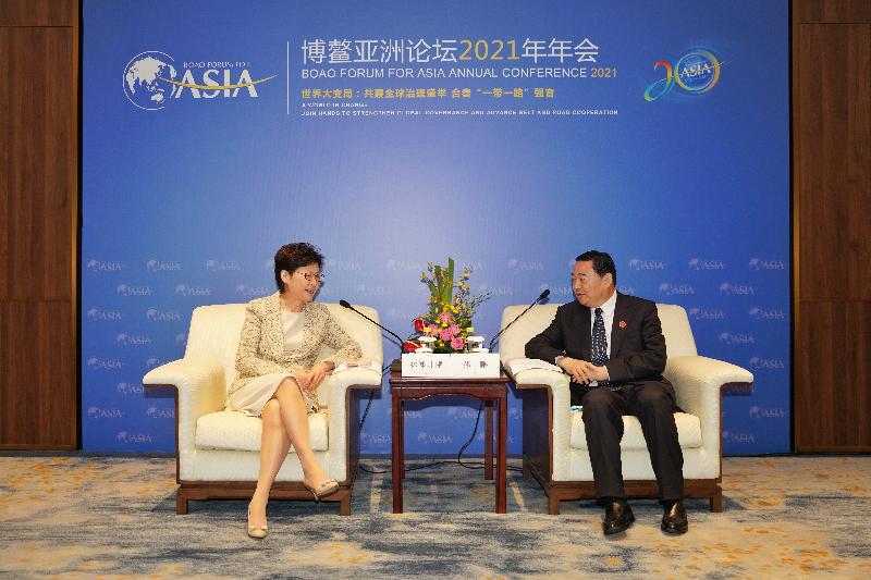 The Chief Executive, Mrs Carrie Lam, today (April 20) attended the Boao Forum for Asia Annual Conference 2021 in Hainan. Photo shows Mrs Lam (left) meeting with the Chairman of the State-owned Assets Supervision and Administration Commission of the State Council, Mr Hao Peng (right).