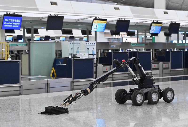 The Explosive Ordnance Disposal Bureau used a robot to handle the suspicious object that is suspected to be a bomb.