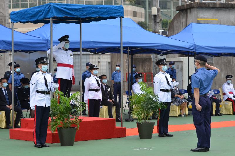 The Civil Aid Service (CAS) held the 81st Recruits Passing-out Parade at its headquarters today (April 25). Photo shows the Acting Deputy Commissioner (Development and Youth) of the CAS, Mr Ng Kwok-fai, taking the salute from the parade.